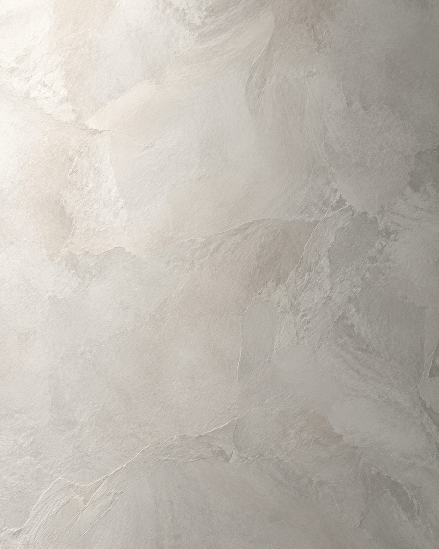 Macro detail of hand-troweled Venetian plaster showing burnished movement in the surface.